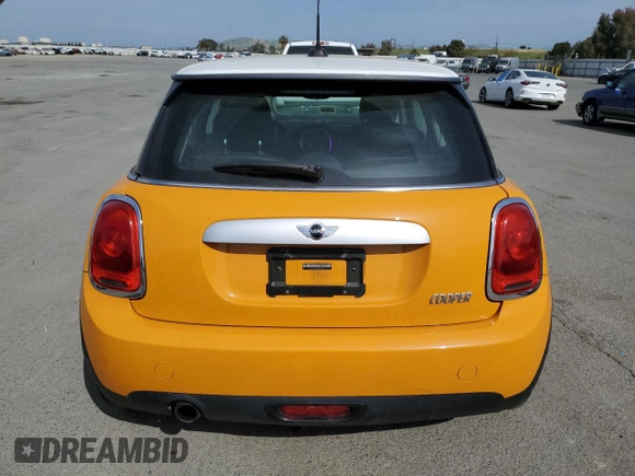 2014 MINI Hardtop with VIN WMWXM5C58ET933445, listed as a Copart auction lot 52769425 with 55,391 mi miles and Salvage Title. Bid and sale history available at DreamBid. Image 6.