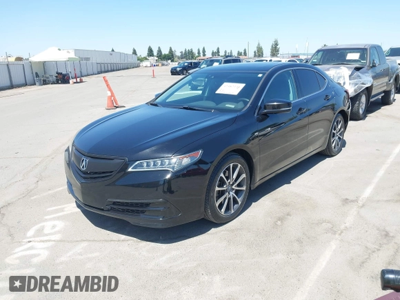 2015 Acura TLX Technology with VIN 19UUB2F54FA019973, listed as a IAAI auction lot 42482331 with 130,004 mi miles and . Bid and sale history available at DreamBid. Image 2.