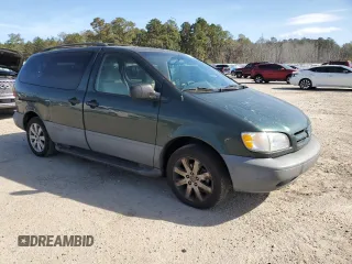 1999 Toyota Sienna LE with VIN 4T3ZF13C9XU097657, listed as a Copart auction lot 79008884 with 361,011 mi miles and Salvage Title. Bid and sale history available at carsss.com. Image 4.