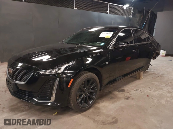 2023 Cadillac CT5 Luxury z VIN 1G6DX5RK7P0135813, wystawiony jako IAAI lot #42130722 z przebiegiem 20 738 mil mil oraz . Historia ofert i sprzedaży dostępna na DreamBid. Obrazek 2.