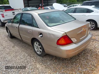 2000 Toyota Avalon XL z VIN 4T1BF28B2YU048155, wystawiony jako IAAI lot #42350570 z przebiegiem 254 043 mil mil oraz . Historia ofert i sprzedaży dostępna na DreamBid. Obrazek 3.