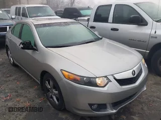 2010 Acura TSX with VIN JH4CU2F62AC011704, listed as a IAAI auction lot 41111267 with 239,403 mi miles. Bid and sale history available at carsss.com. Image 1.
