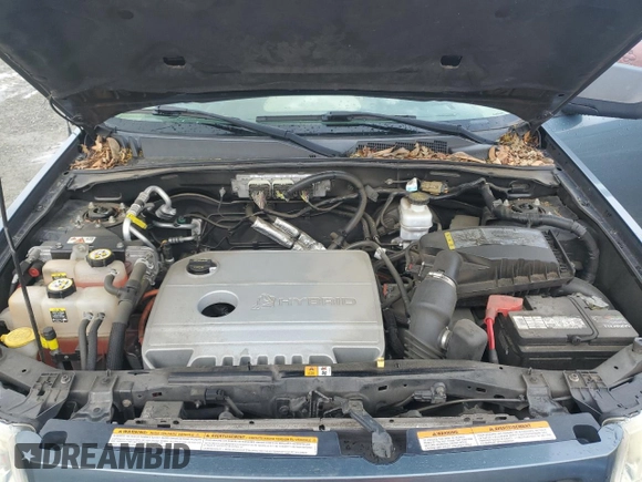 2011 Ford Escape Hybrid z VIN 1FMCU4K34BKC63661, wystawiony jako Copart lot #50991195 z przebiegiem 109 791 mil mil oraz Szkoda całkowita • Salvage title. Historia ofert i sprzedaży dostępna na DreamBid. Obrazek 12.