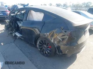 2024 Tesla Model Y Performance with VIN 7SAYGDEF7RF021464, listed as a IAAI auction lot 41225432 with Not Provided miles and . Bid and sale history available at DreamBid. Image 3.