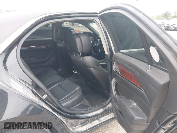 2014 Cadillac CTS Luxury AWD with VIN 1G6AX5SX9E0197395, listed as a IAAI auction lot 42211452 with 90,657 mi miles and . Bid and sale history available at DreamBid. Image 8.