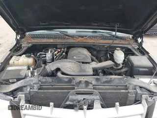 2005 Cadillac Escalade z VIN 1GYEC63TX5R203156, wystawiony jako IAAI lot #41937137 z przebiegiem 239 919 mil mil oraz . Historia ofert i sprzedaży dostępna na DreamBid. Obrazek 10.