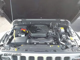 2021 Jeep Wrangler Unlimited Rubicon with VIN 1C4HJXFNXMW560512, listed as a IAAI auction lot 42124812 with 18,034 mi miles and . Bid and sale history available at DreamBid. Image 10.