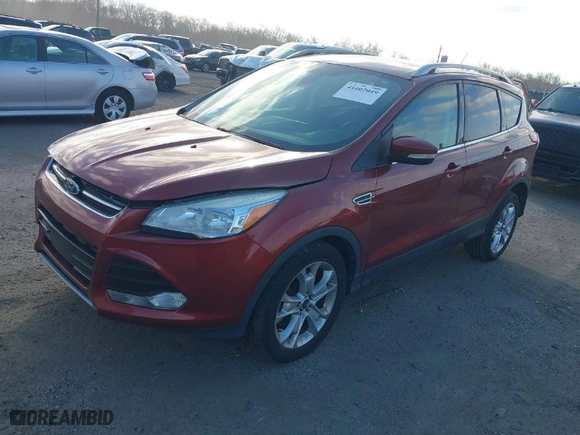 2014 Ford Escape Titanium with VIN 1FMCU9JX8EUB05561, listed as a IAAI auction lot 41602049 with 164,951 mi miles. Bid and sale history available at carsss.com. Image 2.