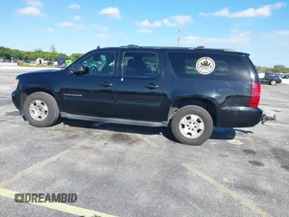 2011 Chevrolet Suburban LS with VIN 1GNSCHE04BR284777, listed as a IAAI auction lot 41291991 with 285,187 mi miles. Bid and sale history available at carsss.com. Image 14.