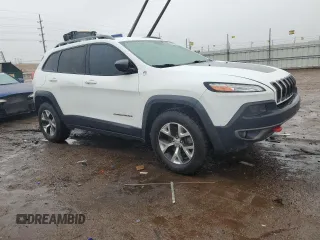 2017 Jeep Cherokee Trailhawk with VIN 1C4PJMBS1HW622388, listed as a Copart auction lot 54990075 with 101,437 mi miles and Salvage title. Bid and sale history available at DreamBid. Image 4.