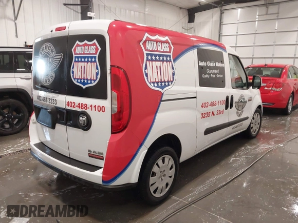 2017 Ram ProMaster City Cargo Van Tradesman SLT with VIN ZFBERFBB9H6E69115, listed as a IAAI auction lot 41798498 with 131,463 mi miles. Bid and sale history available at carsss.com. Image 4.