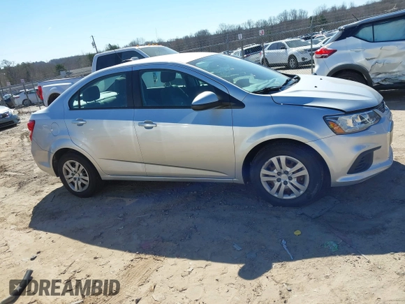 2018 Chevrolet Sonic LS with VIN 1G1JB5SH2J4112817, listed as a IAAI auction lot 41620486 with 60,479 mi miles and . Bid and sale history available at DreamBid. Image 13.