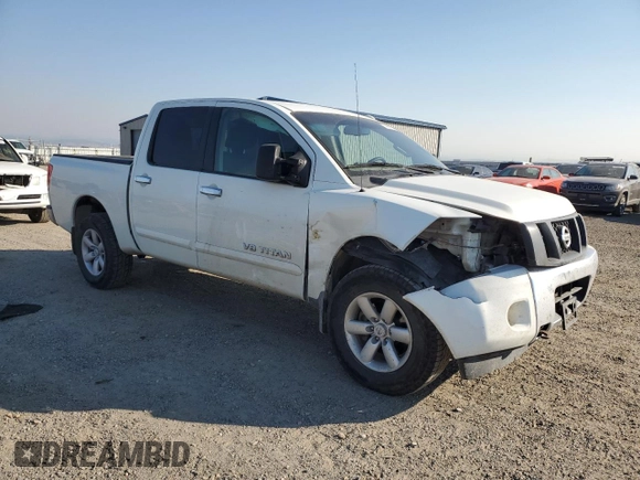2015 Nissan Titan SV with VIN 1N6AA0EC1FN507132, listed as a Copart auction lot 74401954 with 169,236 mi miles and Salvage title. Bid and sale history available at DreamBid. Image 4.