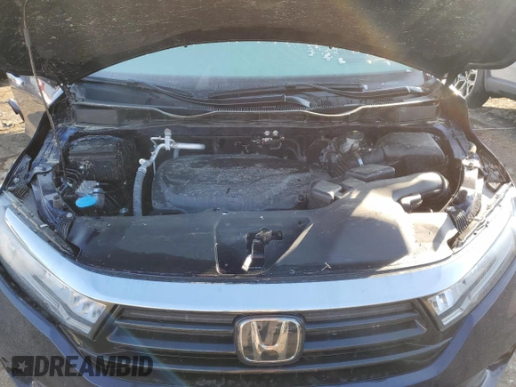 2024 Honda Odyssey EX-L with VIN 5FNRL6H69RB066846, listed as a Copart auction lot 52142105 with 9,117 mi miles and Salvage Title. Bid and sale history available at DreamBid. Image 14.