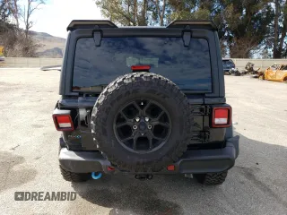 2024 Jeep Wrangler Willys z VIN 1C4RJXN67RW217419, wystawiony jako Copart lot #45734555 z przebiegiem 2 438 mil mil oraz Szkoda całkowita • Salvage title. Historia ofert i sprzedaży dostępna na DreamBid. Obrazek 6.