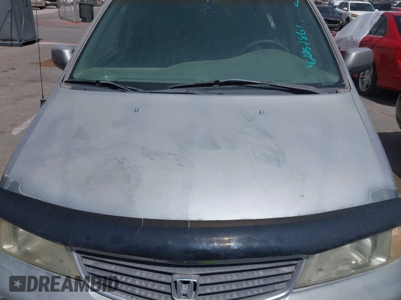 2000 Honda Odyssey EX with VIN 2HKRL1865YH569356, listed as a IAAI auction lot 42257861 with Not provided miles and . Bid and sale history available at DreamBid. Image 10.