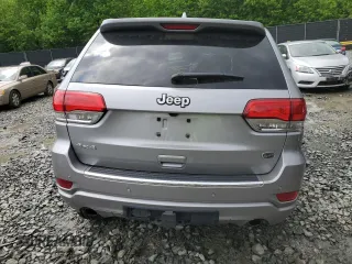 2018 Jeep Grand Cherokee Overland z VIN 1C4RJFCTXJC108624, wystawiony jako Copart lot #53738094 z przebiegiem 83 040 mil mil oraz . Historia ofert i sprzedaży dostępna na DreamBid. Obrazek 6.