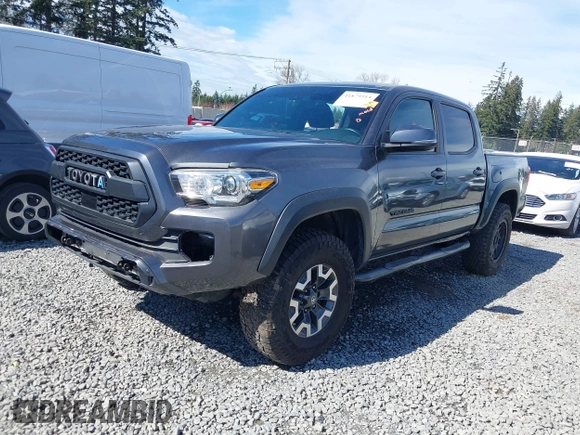 2019 Toyota Tacoma SR z VIN 3TMCZ5AN9KM232882, wystawiony jako IAAI lot #41879314 z przebiegiem Nie podano mil oraz . Historia ofert i sprzedaży dostępna na DreamBid. Obrazek 2.