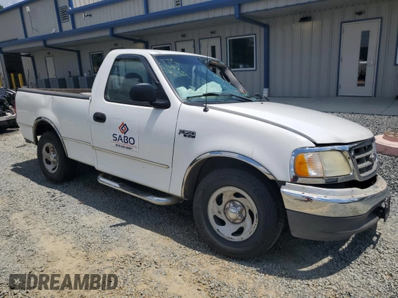 2002 Ford F-150 XL with VIN 1FTRF17282NB09380, listed as a Copart auction lot 62017964 with 0 mi miles and Salvage Title. Bid and sale history available at carsss.com. Image 4.