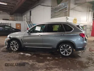 2018 BMW X5 xDrive35i with VIN 5UXKR0C53J0Y03214, listed as a IAAI auction lot 41509082 with 92,552 mi miles. Bid and sale history available at carsss.com. Image 14.