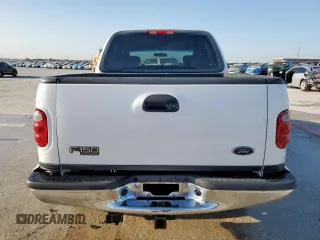 2002 Ford F-150 XLT with VIN 1FTRW08692KD89789, listed as a Copart auction lot 52621555 with 150,012 mi miles and Salvage Title. Bid and sale history available at carsss.com. Image 6.