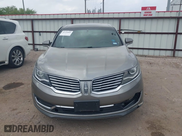 2016 Lincoln MKX Select with VIN 2LMTJ6KR8GBL63843, listed as a IAAI auction lot 41936801 with 96,829 mi miles. Bid and sale history available at carsss.com. Image 12.