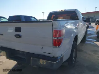 2014 Ford F-150 XL with VIN 1FTNF1CF8EKD18647, listed as a IAAI auction lot 41719409 with 246,241 mi miles. Bid and sale history available at carsss.com. Image 4.