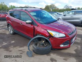 2016 Ford Escape SE z VIN 1FMCU9G91GUA83186, wystawiony jako IAAI lot #42190519 z przebiegiem 103 583 mil mil oraz . Historia ofert i sprzedaży dostępna na DreamBid. Obrazek 6.