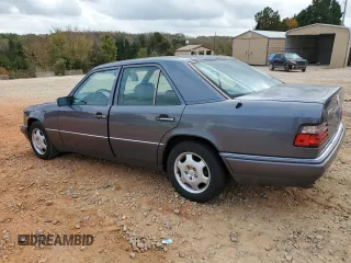 1995 Mercedes-Benz E Class with VIN WDBEA32E8SC233296, listed as a Copart auction lot 78461594 with 319,361 mi miles and Salvage Title. Bid and sale history available at carsss.com. Image 2.