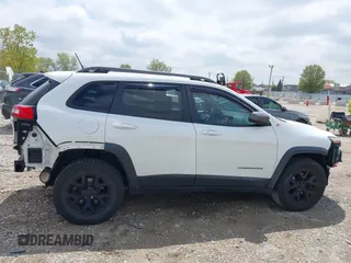 2014 Jeep Cherokee Trailhawk с VIN 1C4PJMBB2EW309183, выставлен на аукционе IAAI как лот 42197601 с пробегом 77 050 миль миль и . История ставок и продаж доступна на DreamBid. Изображение 14.