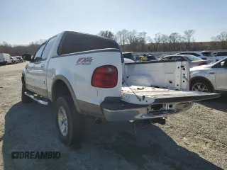 2003 Ford F-150 XLT with VIN 1FTRW08LX3KB16271, listed as a Copart auction lot 49001145 with 281,258 mi miles and Salvage Title. Bid and sale history available at carsss.com. Image 2.