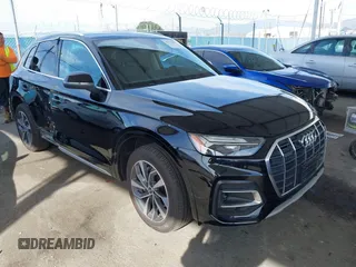 2021 Audi Q5 Premium Plus z VIN WA1BAAFY4M2114032, wystawiony jako IAAI lot #41772441 z przebiegiem 32 638 mil mil oraz . Historia ofert i sprzedaży dostępna na DreamBid. Obrazek 1.
