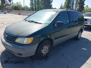 2002 Toyota Sienna LE with VIN 4T3ZF13C62U475863, listed as a IAAI auction lot 42215728 with 151,489 mi miles and . Bid and sale history available at DreamBid. Image 2.
