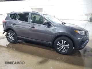 2016 Toyota RAV4 LE with VIN JTMBFREV3GD195188, listed as a Copart auction lot 52217295 with 113,808 mi miles and Salvage Title. Bid and sale history available at DreamBid. Image 4.