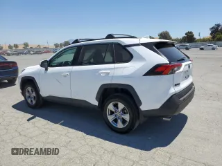 2022 Toyota RAV4 XLE with VIN 2T3W1RFV8NW233397, listed as a Copart auction lot 65276715 with 20,956 mi miles and Salvage title. Bid and sale history available at DreamBid. Image 2.