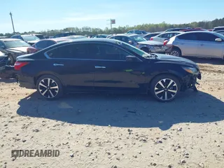 2018 Nissan Altima SR with VIN 1N4AL3AP9JC228304, listed as a IAAI auction lot 41883035 with 53,168 mi miles and . Bid and sale history available at DreamBid. Image 14.