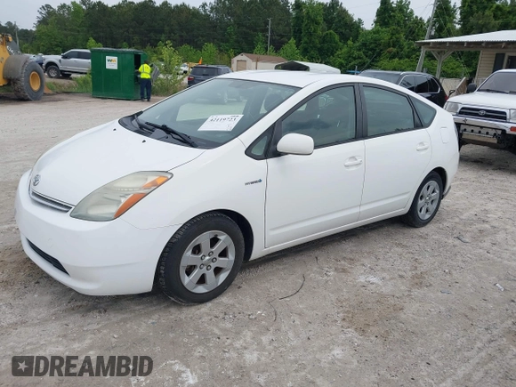 2006 Toyota Prius with VIN JTDKB20U567529834, listed as a IAAI auction lot 42119723 with 209,638 mi miles. Bid and sale history available at carsss.com. Image 2.