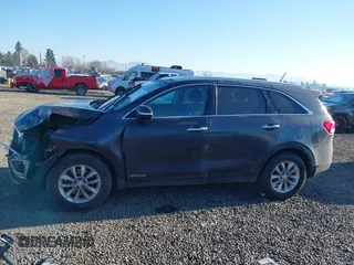 2018 Kia Sorento LX V6 with VIN 5XYPGDA54JG370844, listed as a IAAI auction lot 41412278 with 105,916 mi miles. Bid and sale history available at carsss.com. Image 14.
