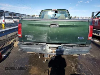 2000 Ford F-250 XL z VIN 1FTNF21L2YEB66074, wystawiony jako Copart lot #84274244 z przebiegiem 100 845 mil mil oraz Czysty tytuł • Clean title. Historia ofert i sprzedaży dostępna na DreamBid. Obrazek 6.