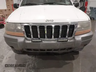 2000 Jeep Grand Cherokee Laredo z VIN 1J4GW48NXYC244327, wystawiony jako IAAI lot #41832166 z przebiegiem 250 822 mil mil oraz . Historia ofert i sprzedaży dostępna na DreamBid. Obrazek 6.