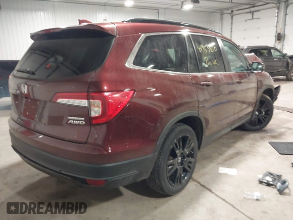 2022 Honda Pilot Special Edition with VIN 5FNYF6H23NB027017, listed as a IAAI auction lot 41953810 with 23,422 mi miles and . Bid and sale history available at DreamBid. Image 4.