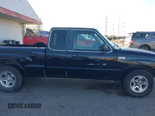 1999 Mazda B-Series 2WD Truck SE with VIN 4F4YR16V8XTM09770, listed as a IAAI auction lot 41416620 with 245,604 mi miles. Bid and sale history available at carsss.com. Image 14.