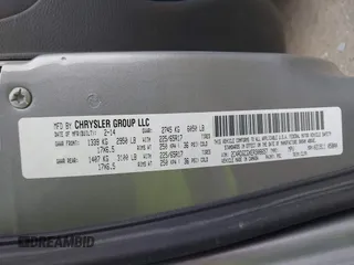 2014 Dodge Grand Caravan SXT with VIN 2C4RDGCGXER308657, listed as a IAAI auction lot 41602422 with 200,643 mi miles and . Bid and sale history available at DreamBid. Image 9.
