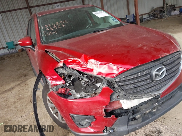 2016 Mazda CX-5 Touring with VIN JM3KE2CY0G0691927, listed as a IAAI auction lot 41611743 with 160,246 mi miles. Bid and sale history available at carsss.com. Image 6.