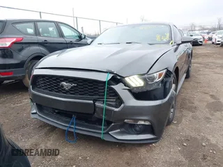 2016 Ford Mustang V6 with VIN 1FA6P8AM5G5337594, listed as a IAAI auction lot 41864037 with 128,117 mi miles and . Bid and sale history available at carsss.com. Image 6.
