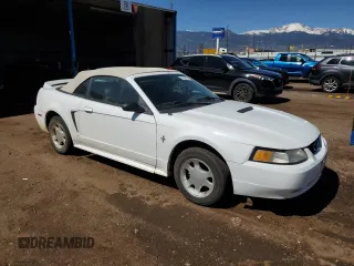 2000 Ford Mustang z VIN 1FAFP4447YF287507, wystawiony jako Copart lot #57669515 z przebiegiem 133 309 mil mil oraz Czysty tytuł • Clean title. Historia ofert i sprzedaży dostępna na DreamBid. Obrazek 4.