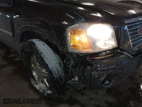 2007 GMC Envoy SLE with VIN 1GKDT13S472123167, listed as a IAAI auction lot 41385620 with 157,680 mi miles. Bid and sale history available at carsss.com. Image 13.