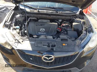 2014 Mazda CX-5 Sport with VIN JM3KE4BE6E0388909, listed as a IAAI auction lot 41876514 with 196,882 mi miles. Bid and sale history available at carsss.com. Image 10.