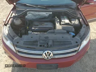 2014 Volkswagen Tiguan SE with VIN WVGAV3AX9EW038118, listed as a Copart auction lot 56329625 with 134,620 mi miles and Salvage title. Bid and sale history available at DreamBid. Image 11.