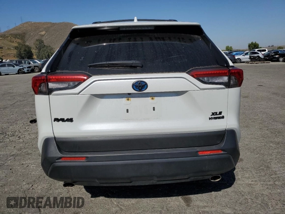 2024 Toyota RAV4 Hybrid XLE Premium with VIN JTMB6RFV6RD120633, listed as a Copart auction lot 57620825 with 28,817 mi miles and Salvage title. Bid and sale history available at DreamBid. Image 6.